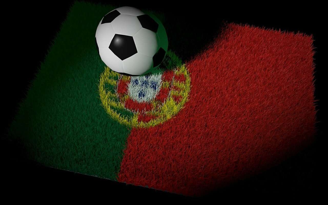 Football ball above the Portugal flag